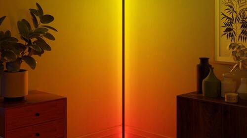 An LED corner lamp lighting up a living room. 