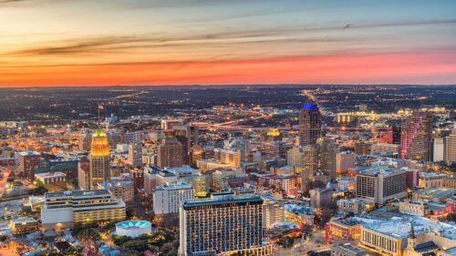 An aerial photo at sunset of downtown San Antonio.