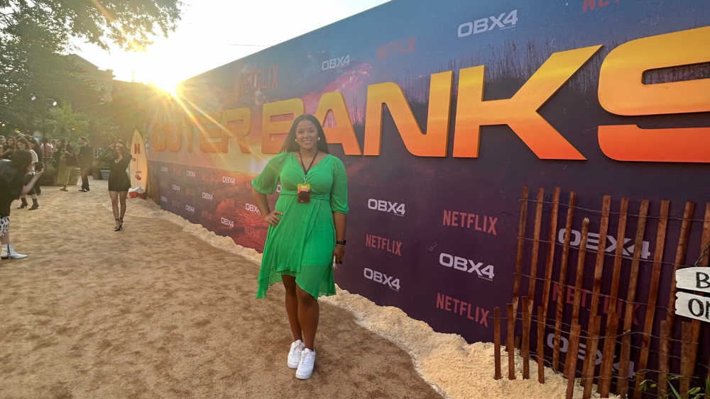 CHStoday City Editor Callie on the sandy carpet at Netflix’s season 4 premiere of "Outer Banks" in Charleston.
