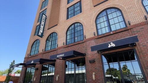 An exterior shot of a big brick hotel in Lexington, KY.