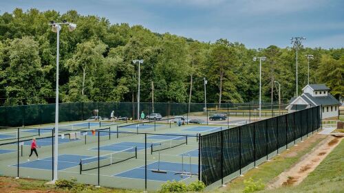 People playing pickleball