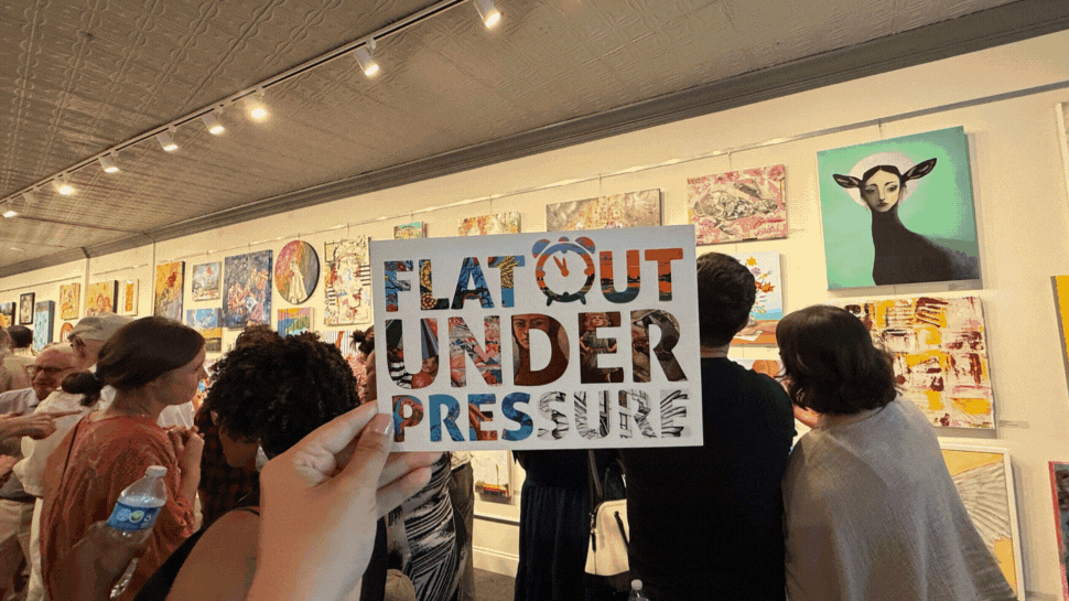 A GIF showing attendees and artworks at the FOUP event.
