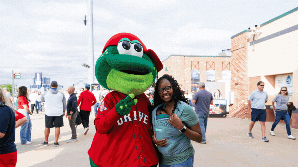 Excited fans at Greenville Drive games.