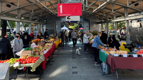 A big pavilion filled with vendor booths.