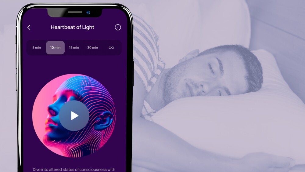 A person sleeping, overlaid by a smart phone open to the calmind app.