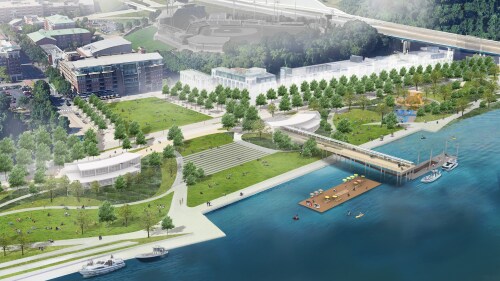 Aerial view of a vibrant urban riverside park, featuring green lawns, trees, walkways, a pier with boats, and nearby city buildings, evoking a lively atmosphere.