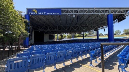 An exterior photo of an outdoor covered ampitheater.