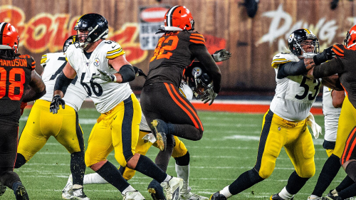 Maurkice Pouncey (No. 53), right, blocks another player during a game against the Cleveland Browns.