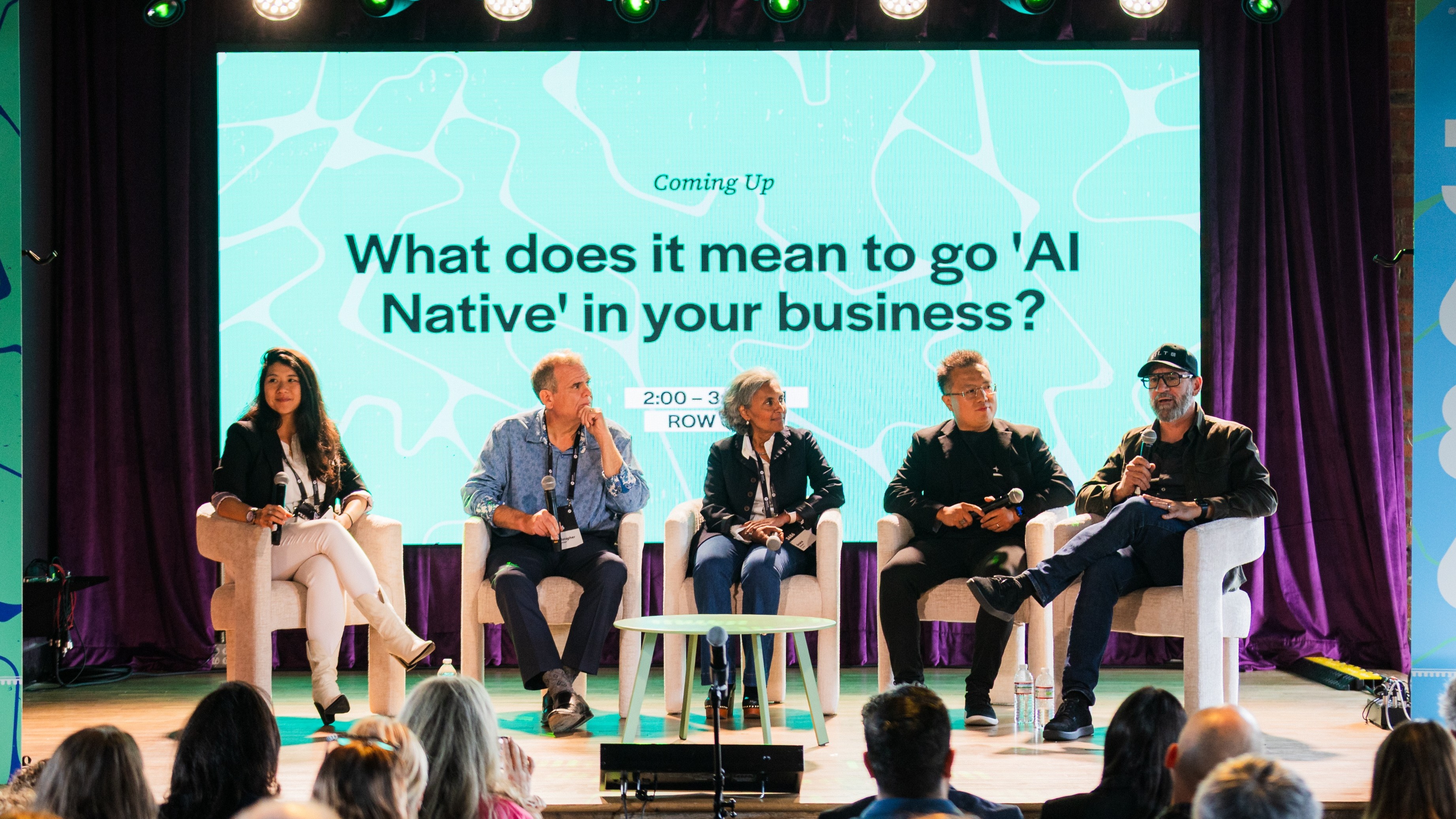 Five panelists sitting on stage at the 3686 conference.