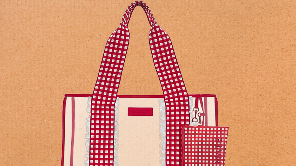 A jelly tote bag against a cardboard background.