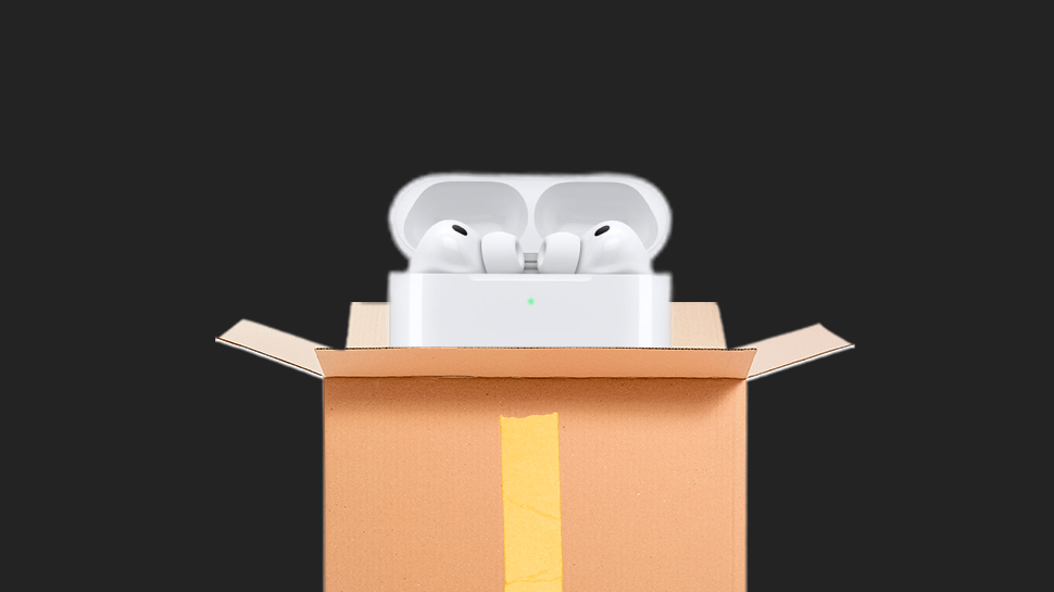 Apple AirPods coming out of a cardboard box.